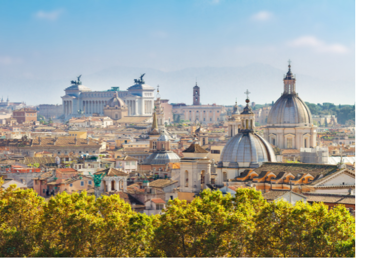 Rome, Altare della Patria, historic skyline with domes, bright daylight, editorial travel photo, no people.