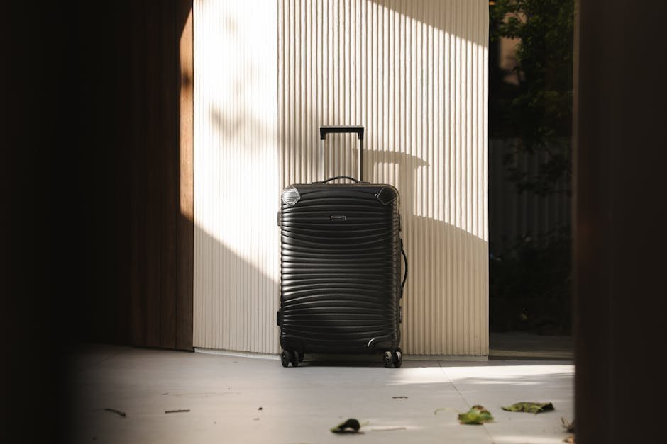 3. Overpacking a Suitcase You Can Barely Lift (Image Credits: Pexels)