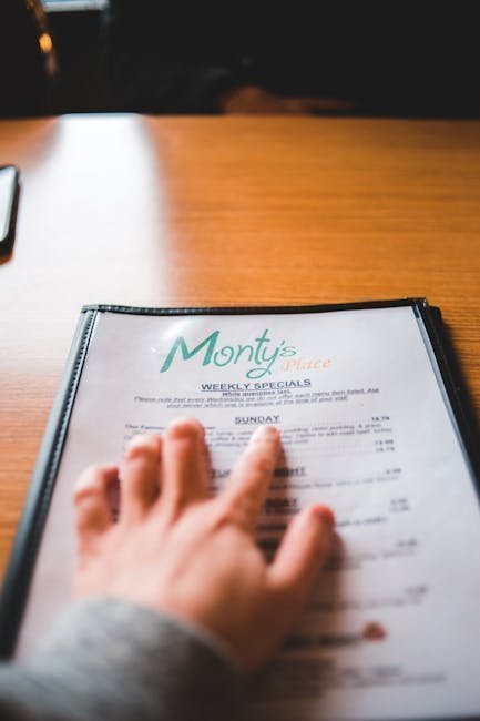 2. A Menu in Five Languages with Plastic Lamination (Image Credits: Pexels)