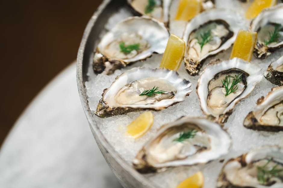 1. Raw Oysters and Shellfish on Ice (Image Credits: Pexels)