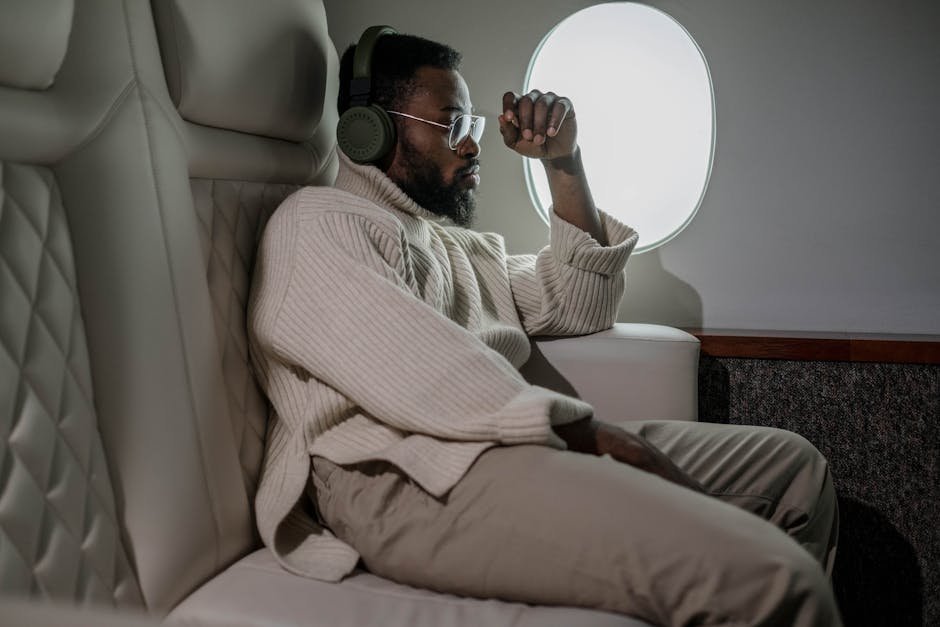 4. Take Your Headphones Off During Service (Image Credits: Pexels)